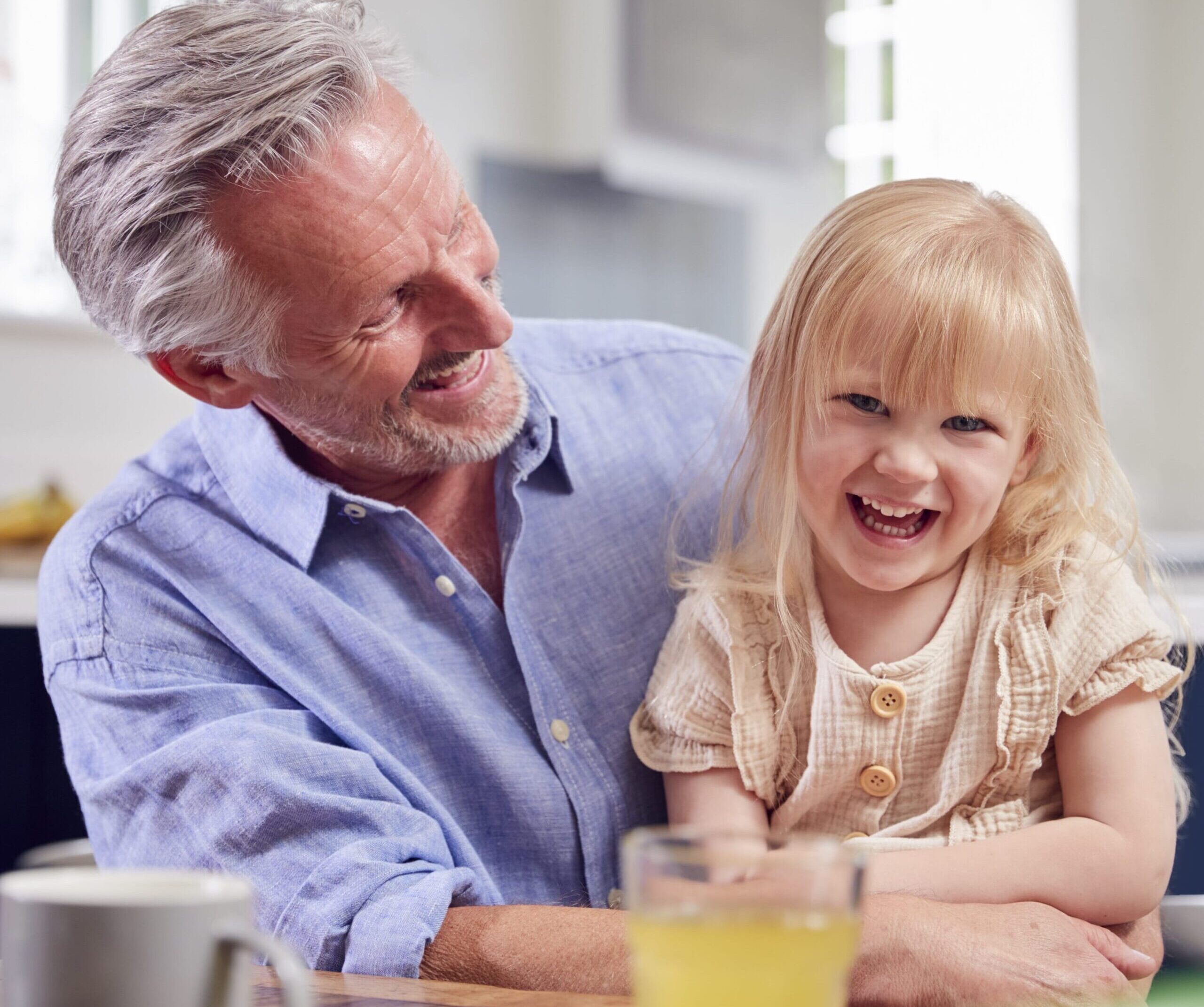 grandfather looking after laughing granddaughter s 2023 11 27 05 03 19 utc min scaled e1723540943412